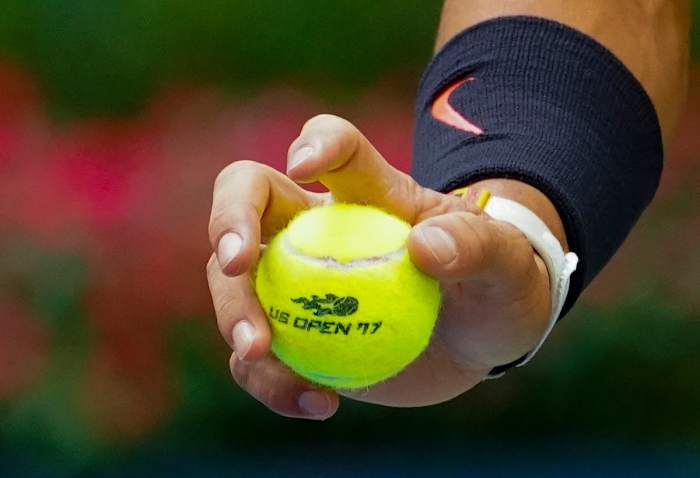 Sept 10, 2017; New York, NY, USA; Detailed view as Rafael Nadal of Spain bounces a tennis ball before serving to Kevin Anderson of South Africa in the Men's Final in Ashe Stadium at the USTA Billie Jean King National Tennis Center. Mandatory Credit: Robert Deutsch-USA TODAY Sports